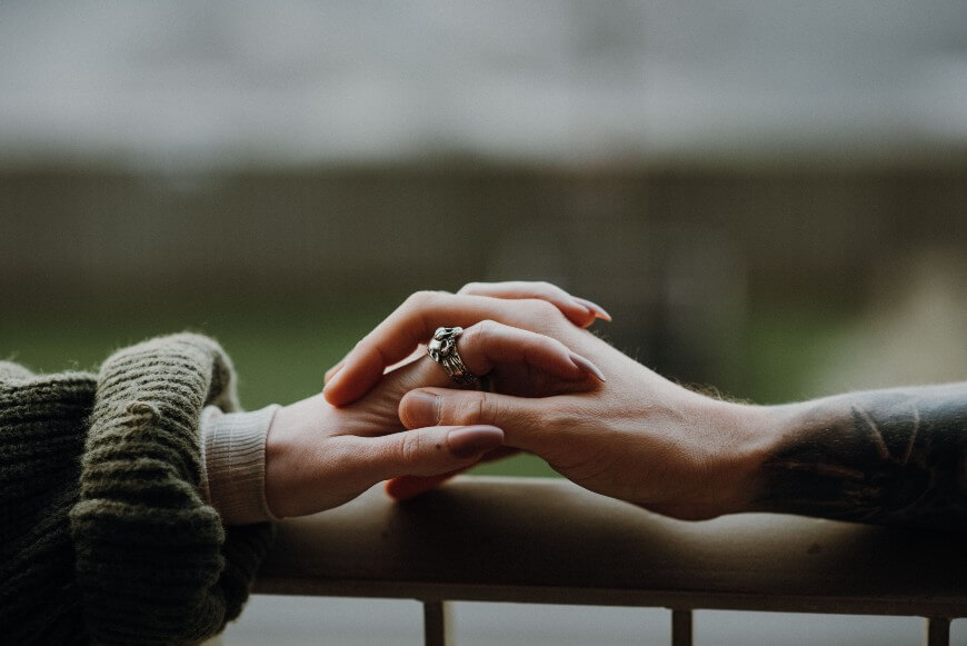 couple in a relationship holding hands