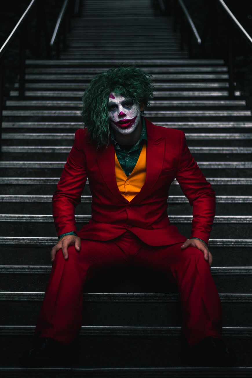 man dressed as the joker for halloween