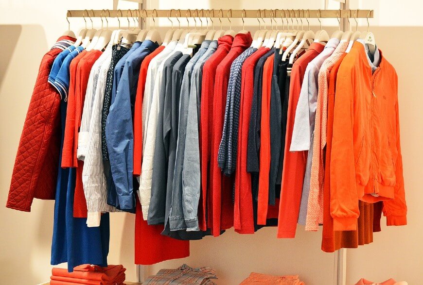 clothing hanging on rail