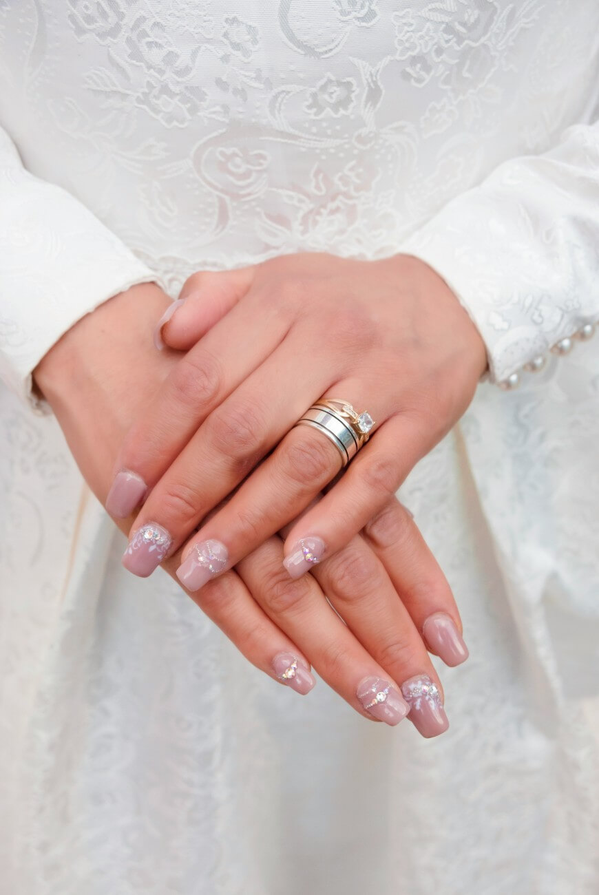 pink nails with gemstones