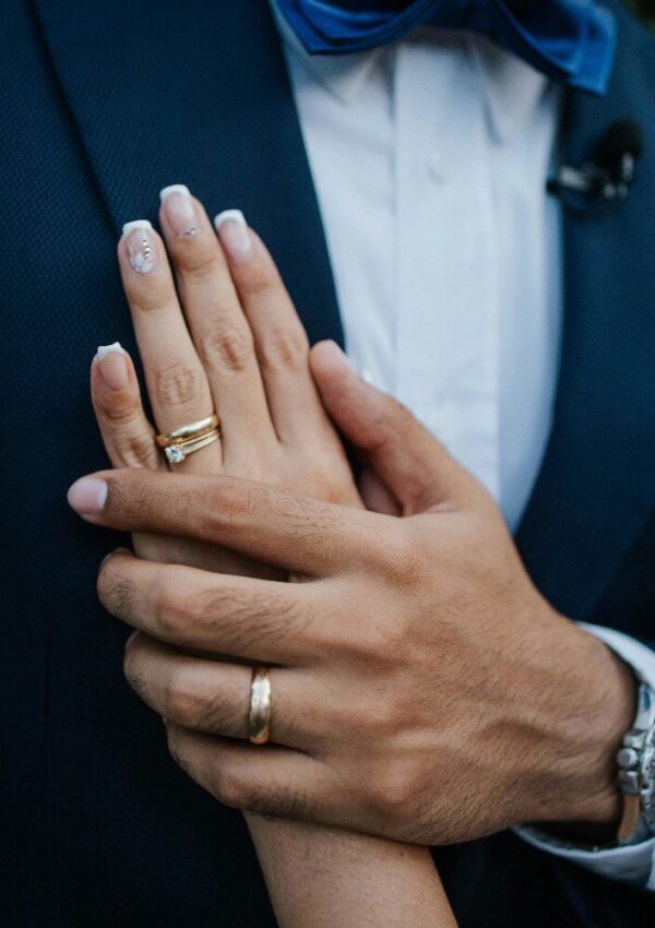 husband and wife holding hands