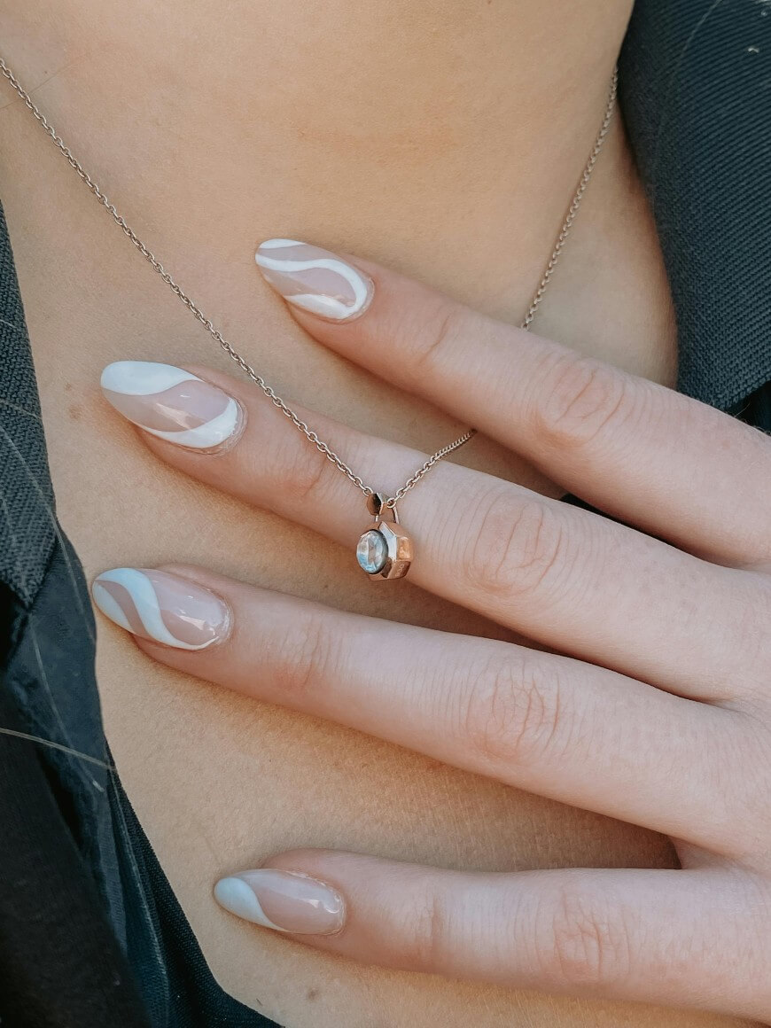 white swirl nail polish design