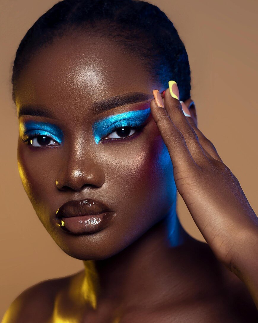 woman with neon nail designs