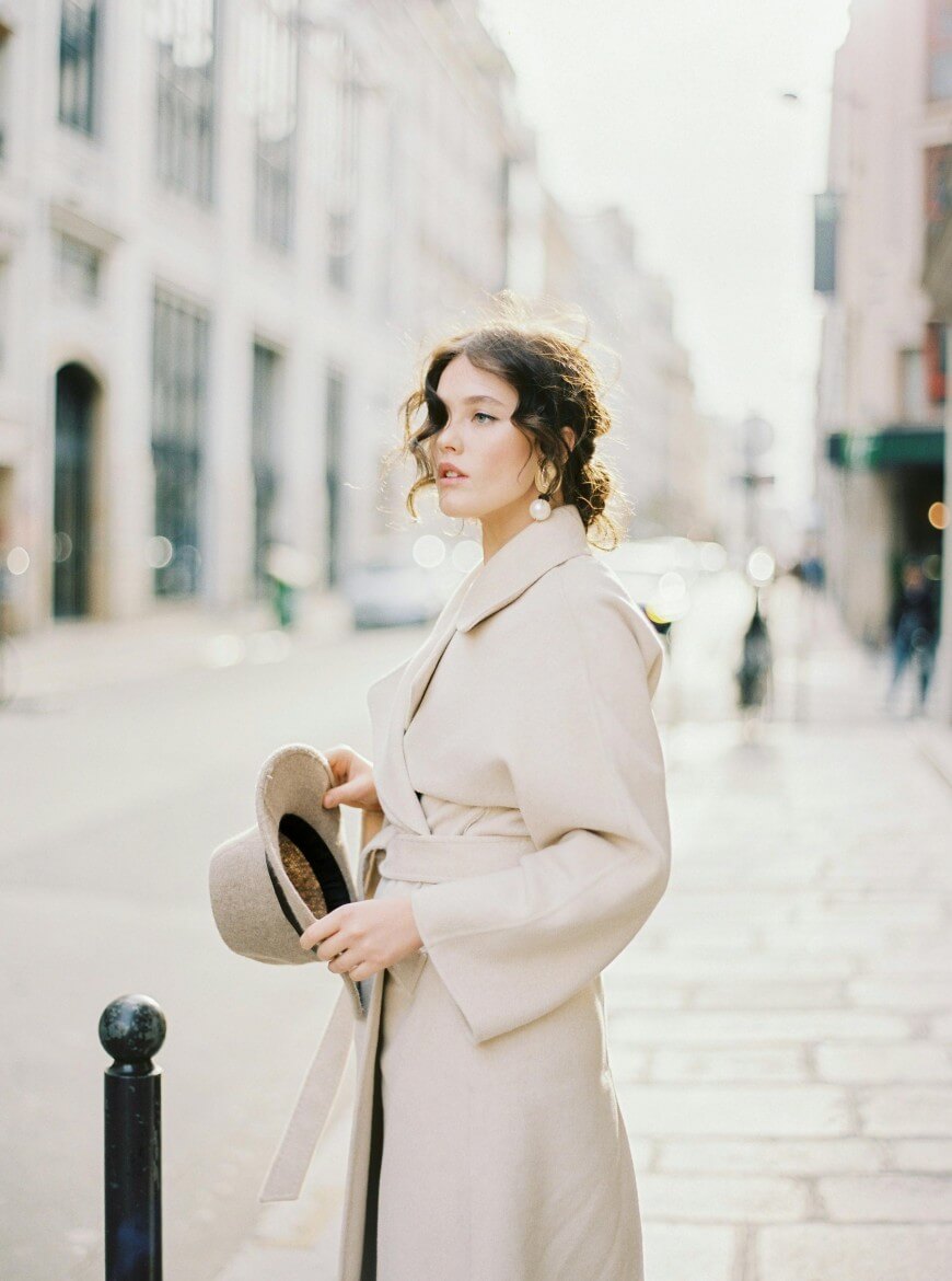 woman with pearl earrings