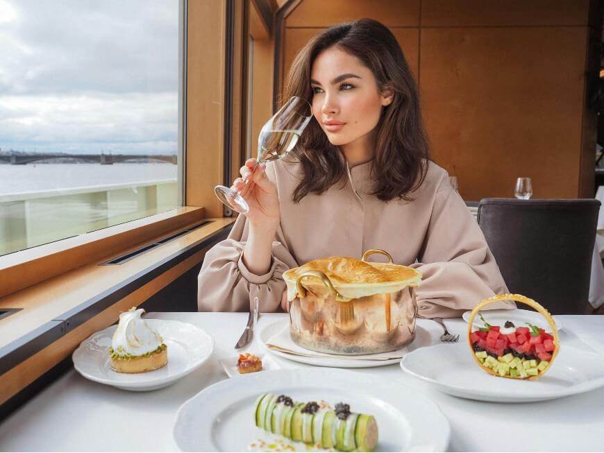 woman eating dinner on a cruise