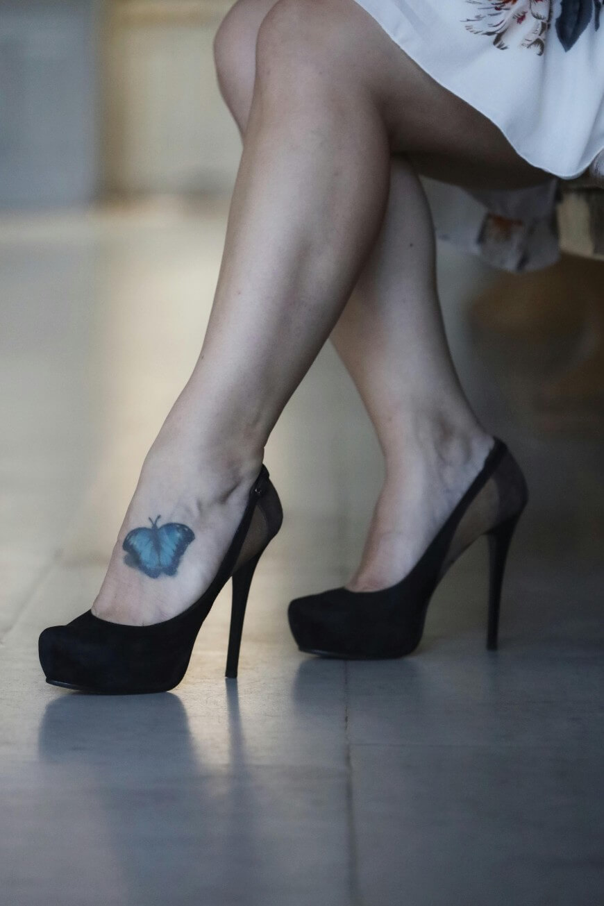 foot tattoo of 3d butterfly