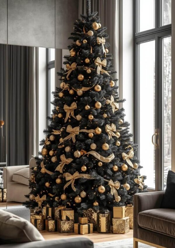 A tall black Christmas tree decorated with gold bows and ornaments stands by large windows, surrounded by gold-wrapped presents in a modern living room with neutral-colored furniture.