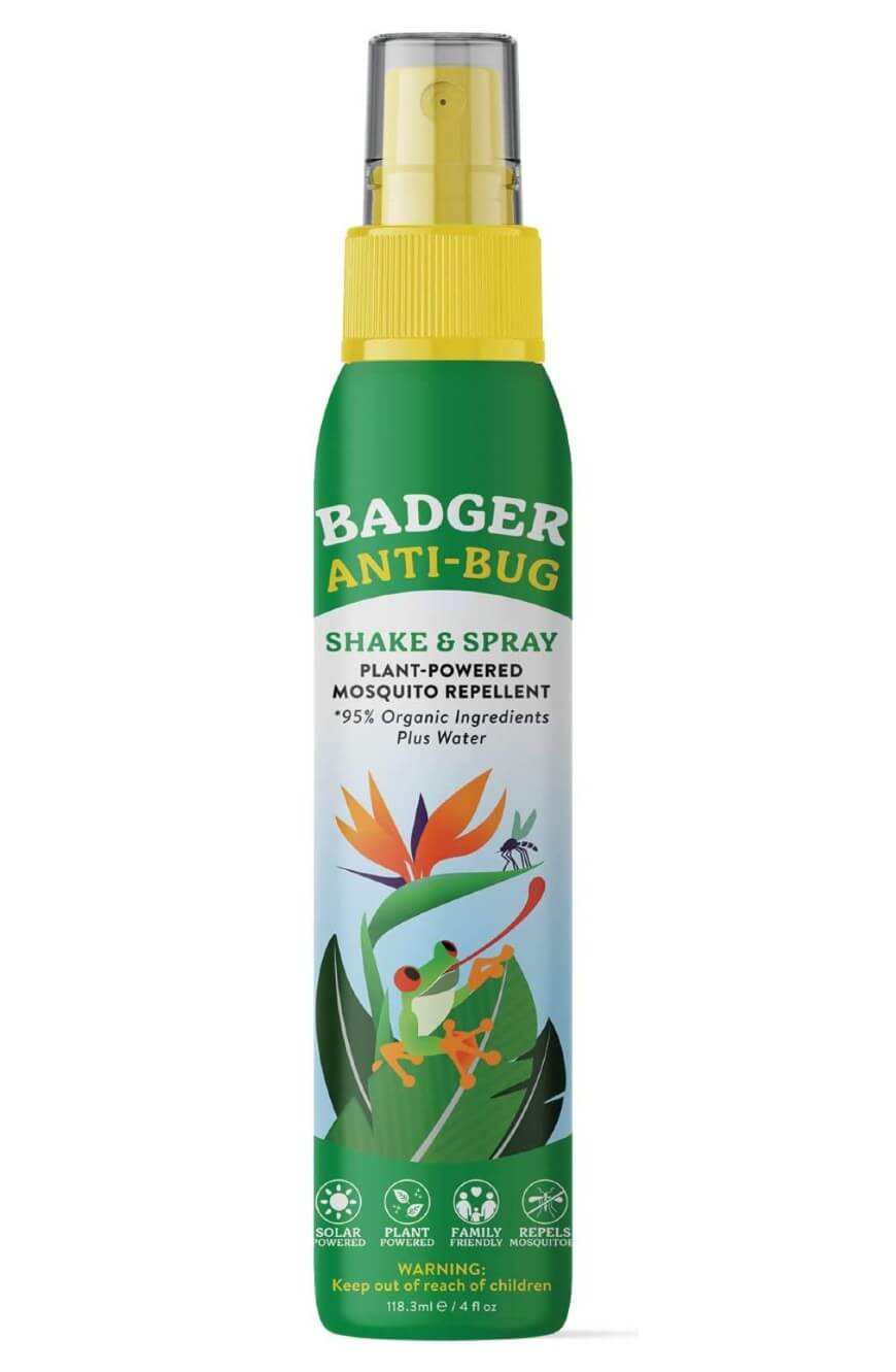 A green and yellow spray bottle of Badger Anti-Bug Shake & Spray mosquito repellent with a bird and leaves illustration on the label; bottle contains 4 fl oz and highlights plant-powered, organic ingredients.