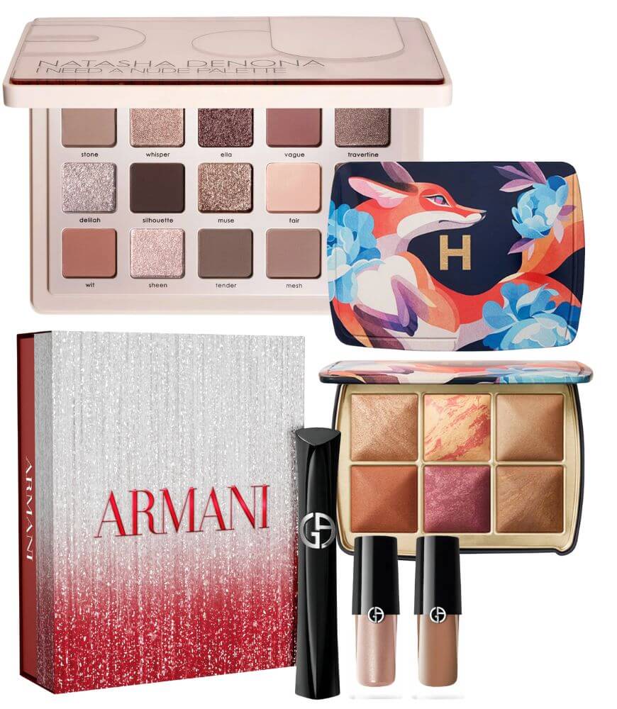 A collection of luxury makeup products, including an eyeshadow palette, a fox-themed compact, a red and silver Armani box with lip products, and a face palette with powders and blushes in various shades.