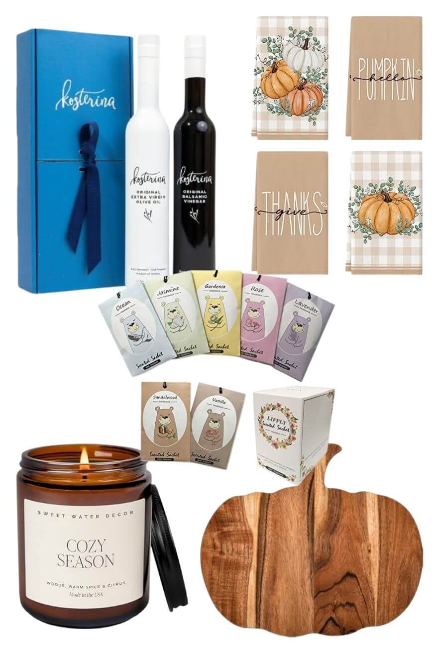 A gift set including olive oils, autumn-themed greeting cards, boxes of herbal teas, a wood pumpkin-shaped cutting board, and a Cozy Season scented candle, all arranged on a white background.