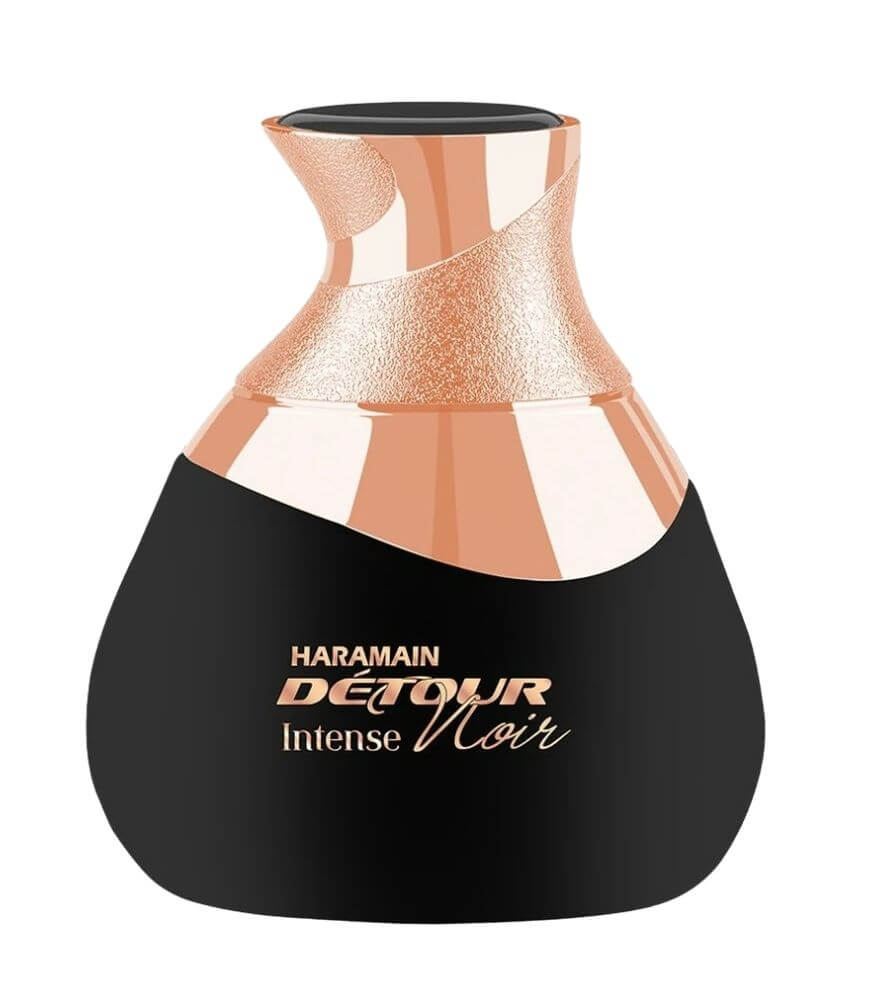A black and rose gold perfume bottle labeled Haramain Détour Intense Noir with an elegant, modern design and a textured metallic top.