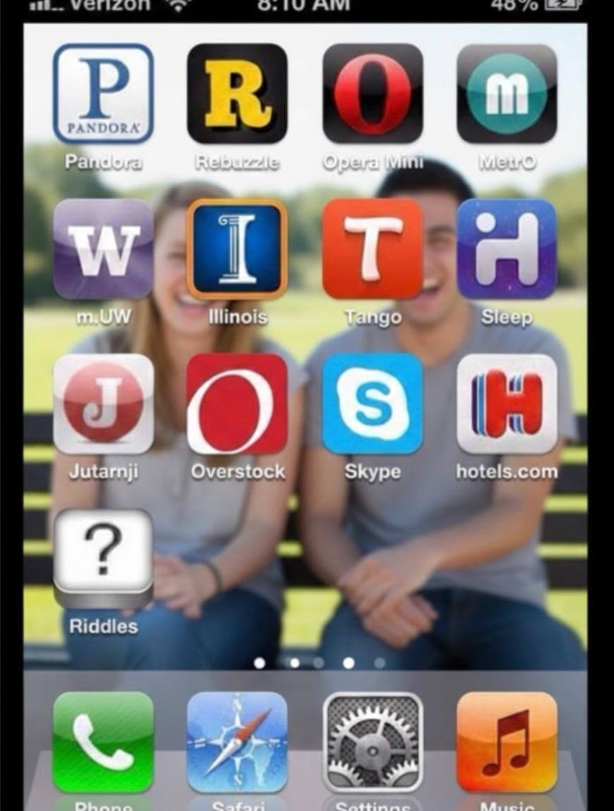 A phone home screen showing apps arranged to spell “PROM WITH JOSH” over a blurred photo of two smiling people sitting on a bench. The app icons include Pandora, Opera Mini, Skype, and others.