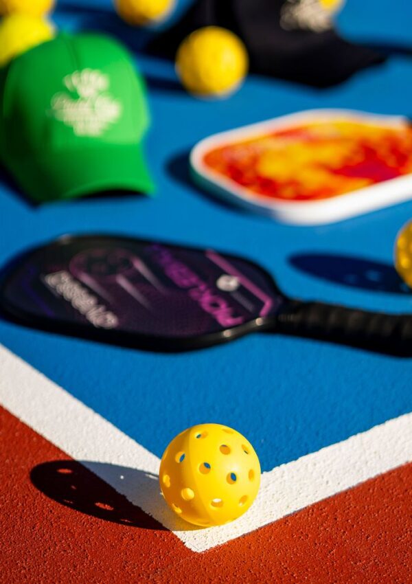Pickleball paddle and gear packed for the court