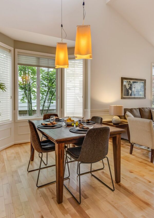 brown-and-black wooden 5-piece dining set